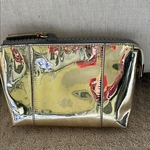 India hicks golden metallic cosmetic bag
